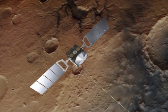 Vue d'artiste. La sonde européenne Mars Express survolant la planète rouge. Un lac d'eau liquide se trouverait à 1,5 km sous la surface.